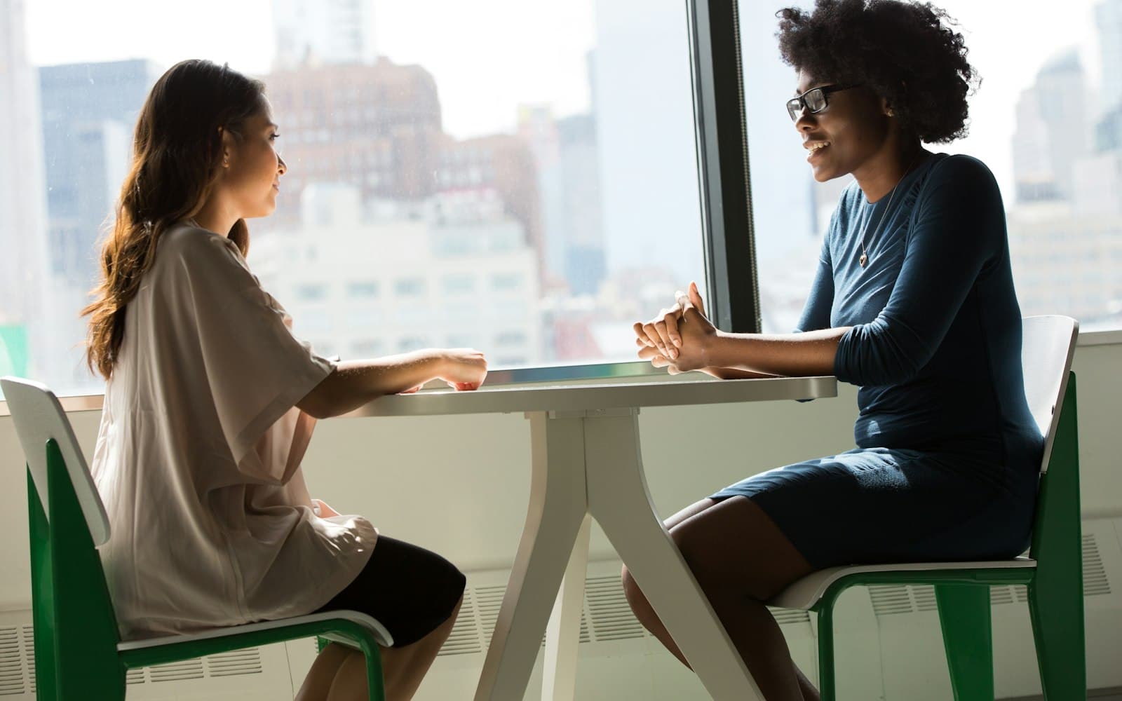 An accredited family dispute resolution practitioner guiding a professional discussion.